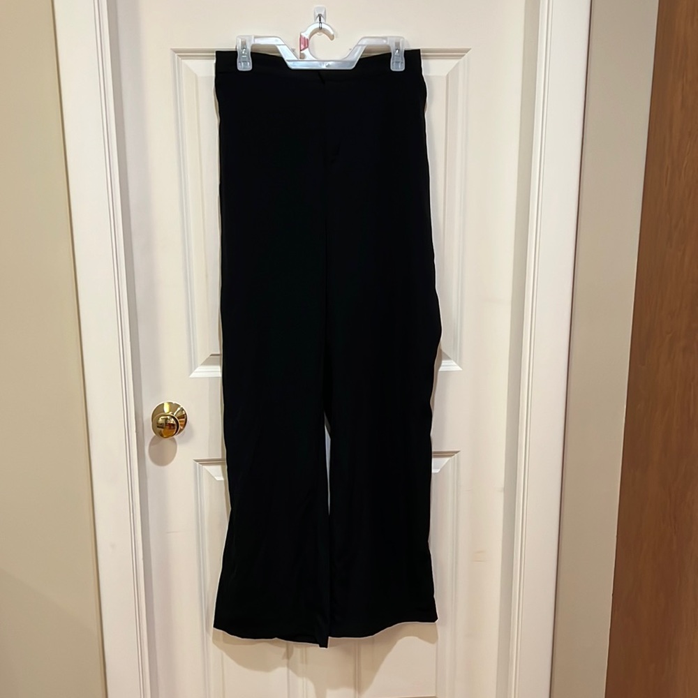 Woman’s black dress pants made by “a•n•d e a w y”. Size 10. Brand new with tags.